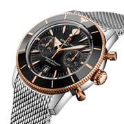 Profilo laterale della cassa rotonda in acciaio inossidabile e oro rosso 18 carati con vetro zaffiro bombato antiriflesso del Superocean Heritage B01 Chronograph 42.